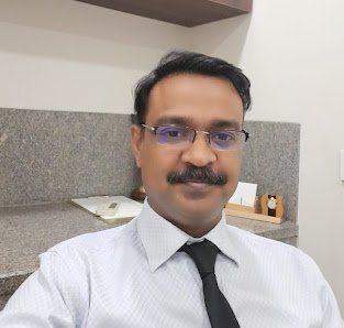 Dr Ashis Acharya